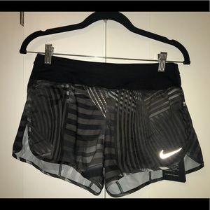 Black printed, Nike Women’s Running shorts. Small